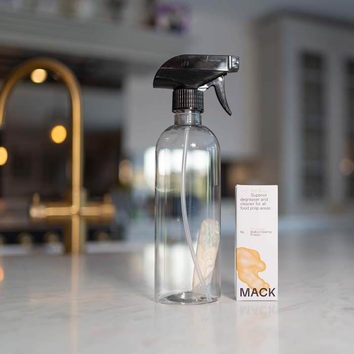 Reusable bottle next to Mack degreaser box