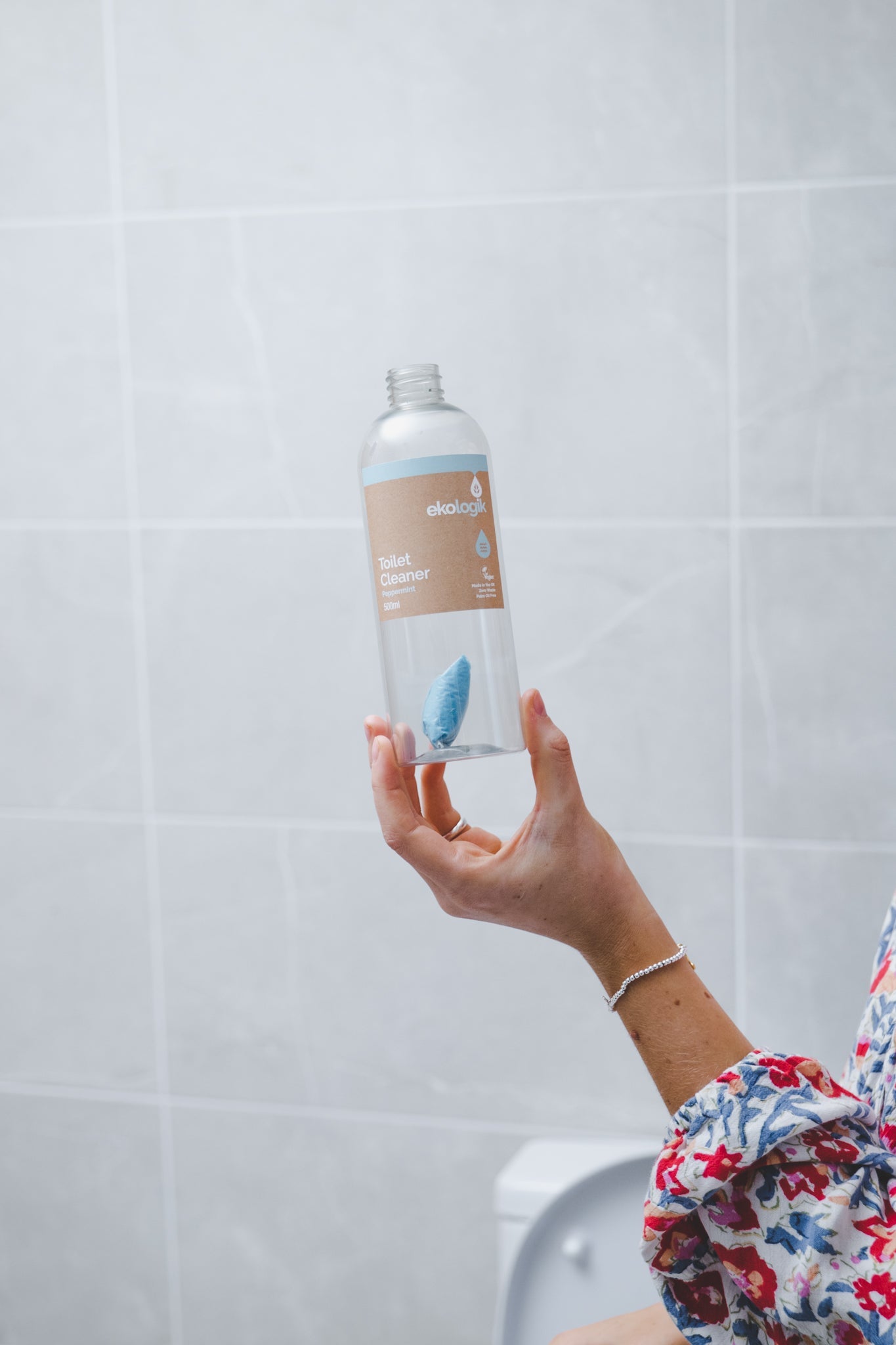 Bottle with concentrate toilet cleaner sachet inside