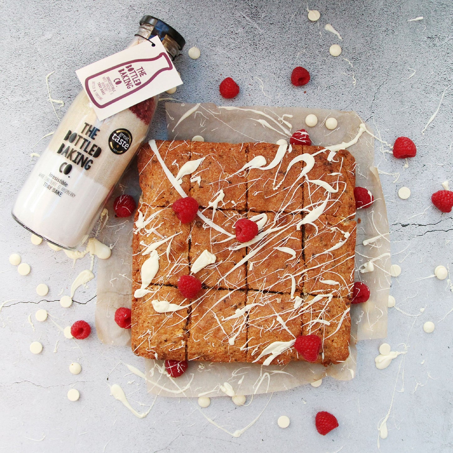 Irresistible White Chocolate & Raspberry Tray Bake cake mix in a Bottle